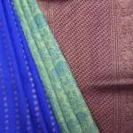 Elachi green and royal blue partly pallu kanchi silk saree with prints